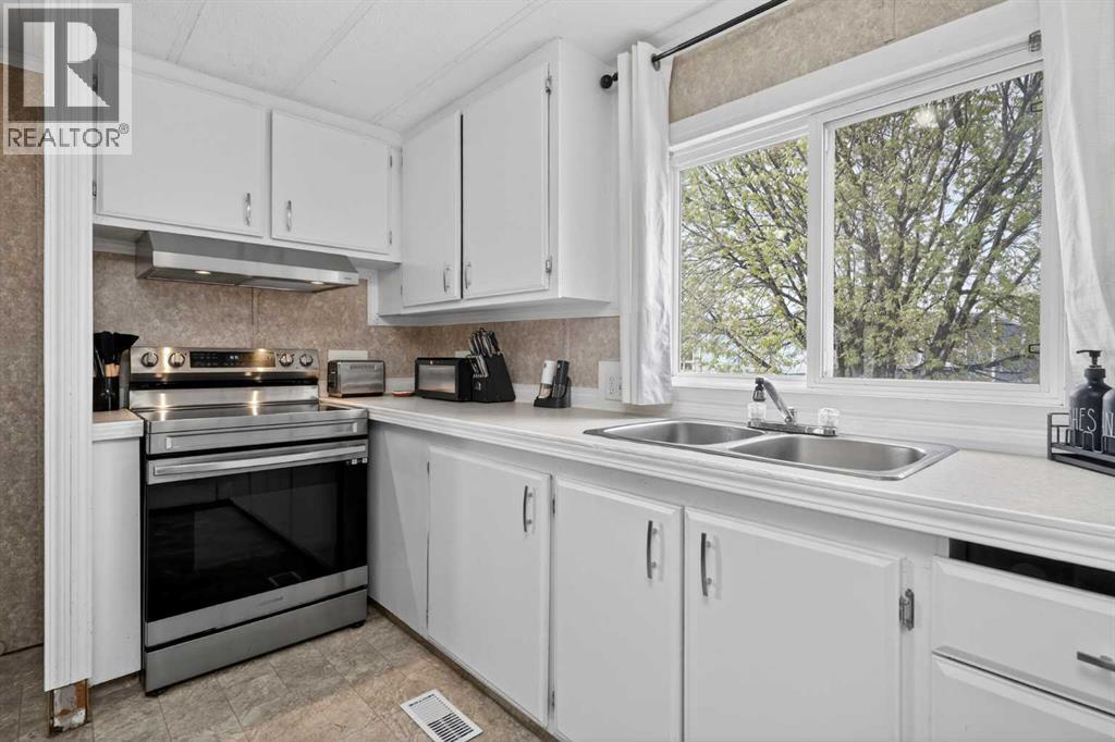 Mobile Home for Sale in 328, 6220 17 Avenue|Calgary, Alberta T2A7H4
