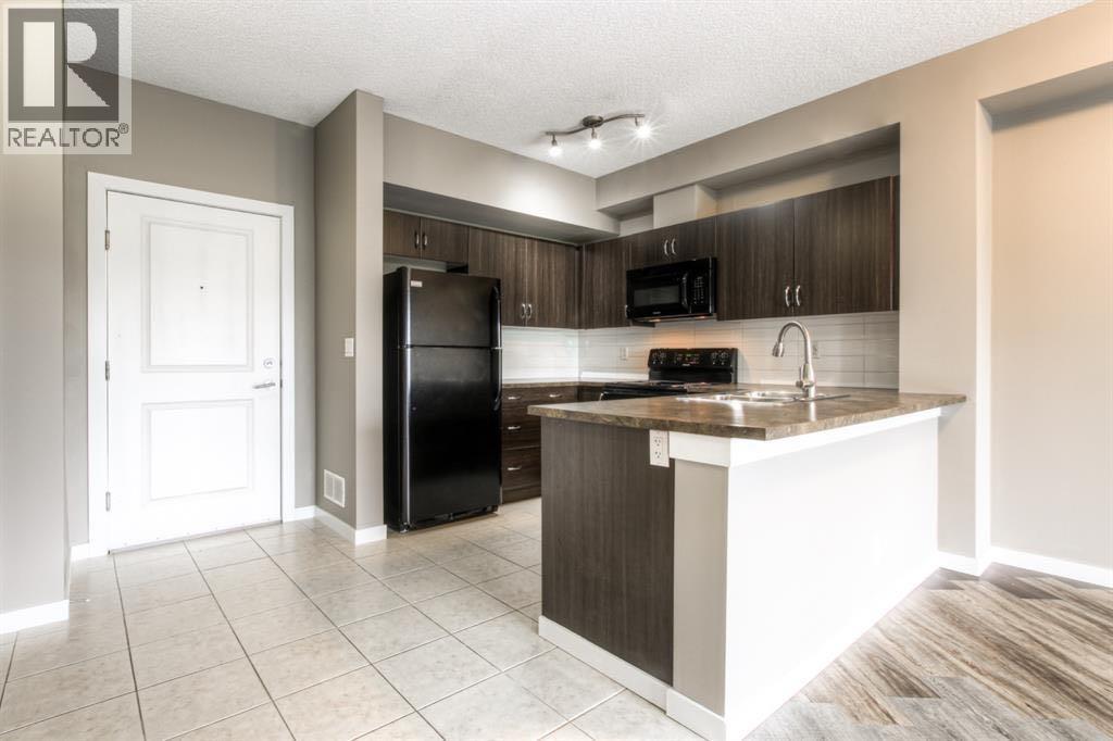 Apartment for Sale in 208, 100 Cranfield Common SE|Calgary, Alberta T3M1S1 4