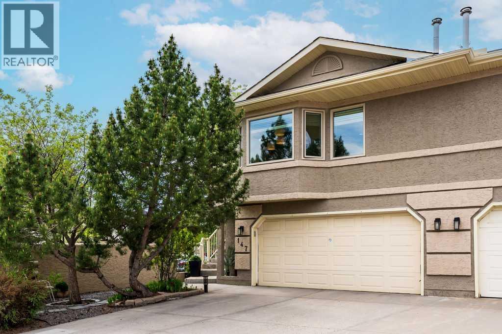 Duplex for Sale in 147 Silver Creek Mews NW|Calgary, Alberta T3B5L2