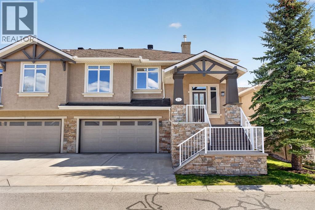 Row / Townhouse for Sale in 14 Discovery Woods Villas SW|Calgary, Alberta T2H5A6