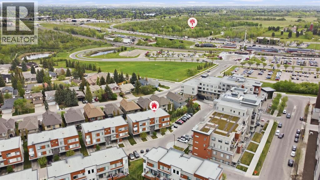 Row / Townhouse for Sale in 84 Shawnee Common SW|Calgary, Alberta T2Y0P9