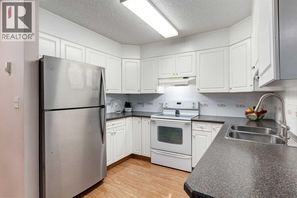 Apartment for Sale in 118, 20 SIERRA MORENA Mews SW|Calgary, Alberta T3H3K6 5