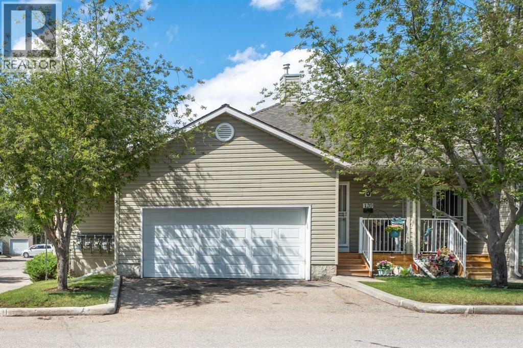Row / Townhouse for Sale in 120 Mt Aberdeen Manor SE|Calgary, Alberta T2Z3N8 2