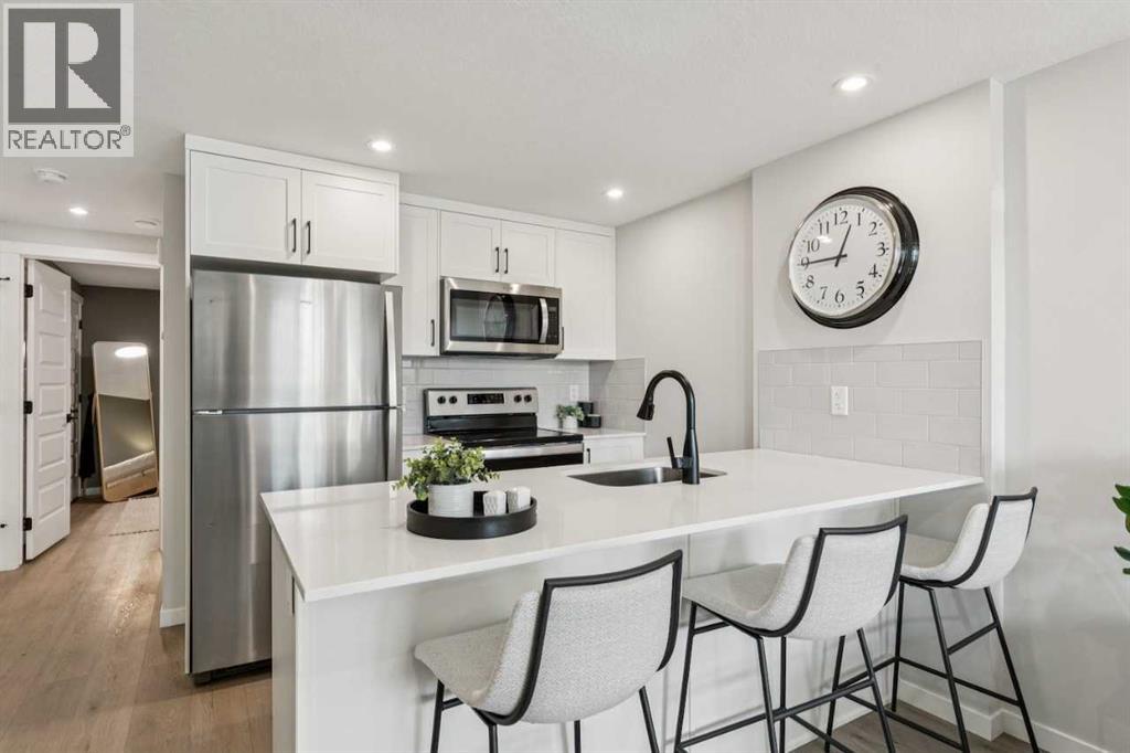 Row / Townhouse for Sale in 105, 155 Crimson Ridge Place NW|Calgary, Alberta T3L2M4 2