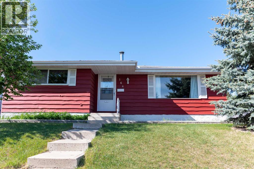 House for Sale in 164 Huntford Road NE|Calgary, Alberta T2K3Y9