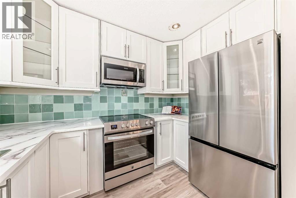 Row / Townhouse for Sale in 8, 714 Willow Park Drive SE|Calgary, Alberta T2J0L8 5