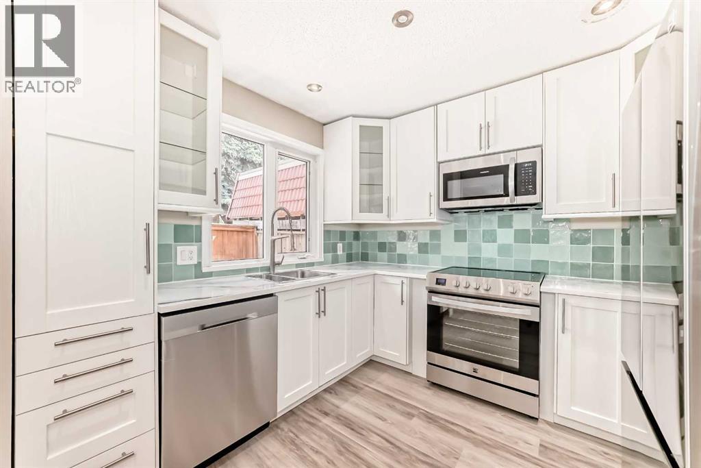Row / Townhouse for Sale in 8, 714 Willow Park Drive SE|Calgary, Alberta T2J0L8 3