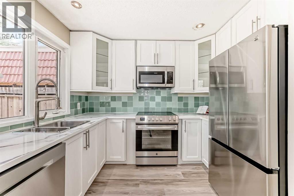 Row / Townhouse for Sale in 8, 714 Willow Park Drive SE|Calgary, Alberta T2J0L8 4