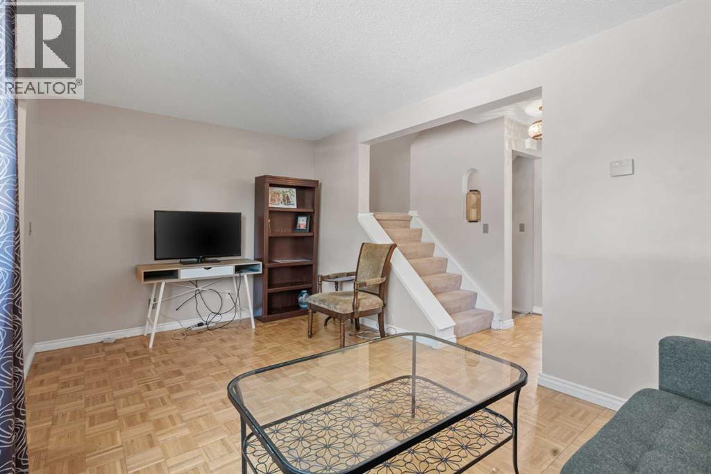Row / Townhouse for Sale in 6646 Huntsbay Road NW|Calgary, Alberta T2K4R3 5
