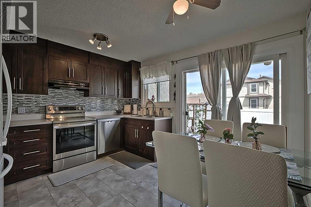 Row / Townhouse for Sale in 72 Deerpoint Road SE|Calgary, Alberta T2J6M9 4