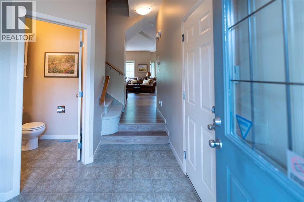 Row / Townhouse for Sale in 22 Rockyvalley Villas NW|Calgary, Alberta T3G5X3 2