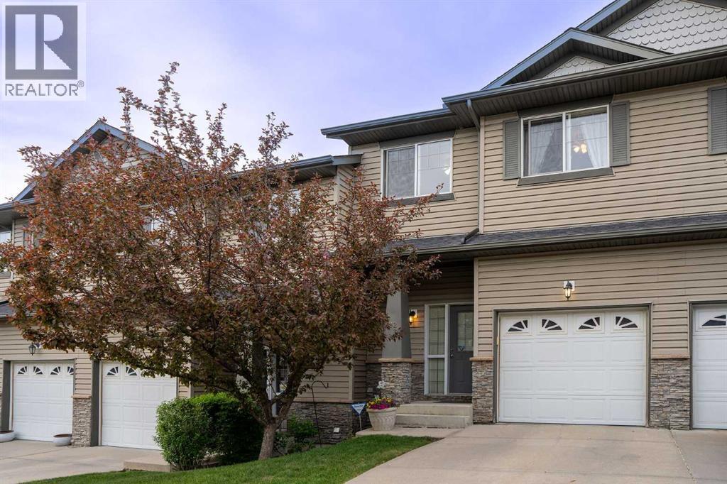 Row / Townhouse for Sale in 22 Rockyvalley Villas NW|Calgary, Alberta T3G5X3