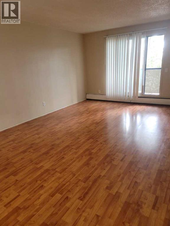 Apartment for Sale in 209, 1712 38 Street SE|Calgary, Alberta t2a1h1 4