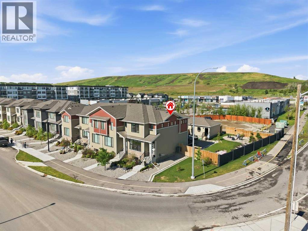 Row / Townhouse for Sale in 7 Wolf Creek Drive SE|Calgary, Alberta T2X4W9