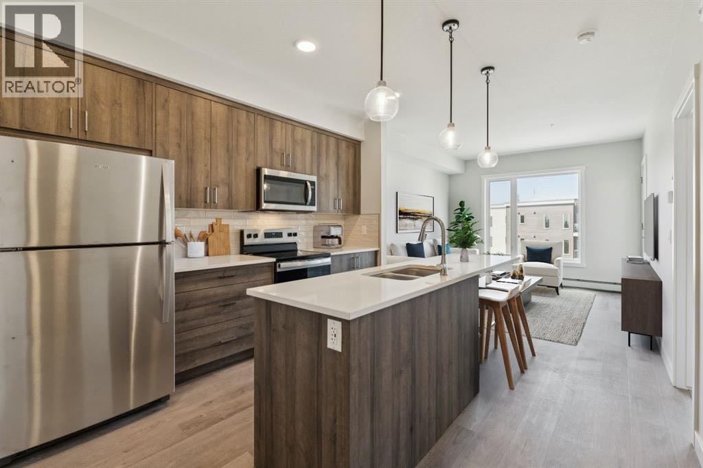 Apartment for Sale in 412, 700 Shawnee Square SW|Calgary, Alberta T2Y0Z6