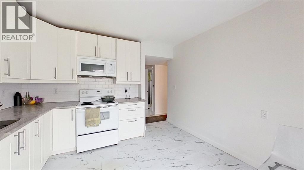 Row / Townhouse for Sale in 101, 1305 Glenmore Trail|Calgary, Alberta T2V4Y8 4