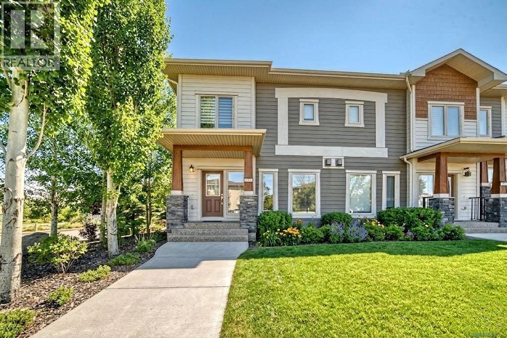 Row / Townhouse for Sale in 12 Cougar Ridge Landing SW|Calgary, Alberta T3H0X8 3