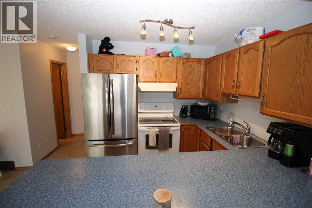Row / Townhouse for Sale in 215 Millview Green SW|Calgary, Alberta T2Y3W1 3
