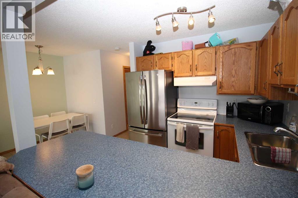 Row / Townhouse for Sale in 215 Millview Green SW|Calgary, Alberta T2Y3W1 4