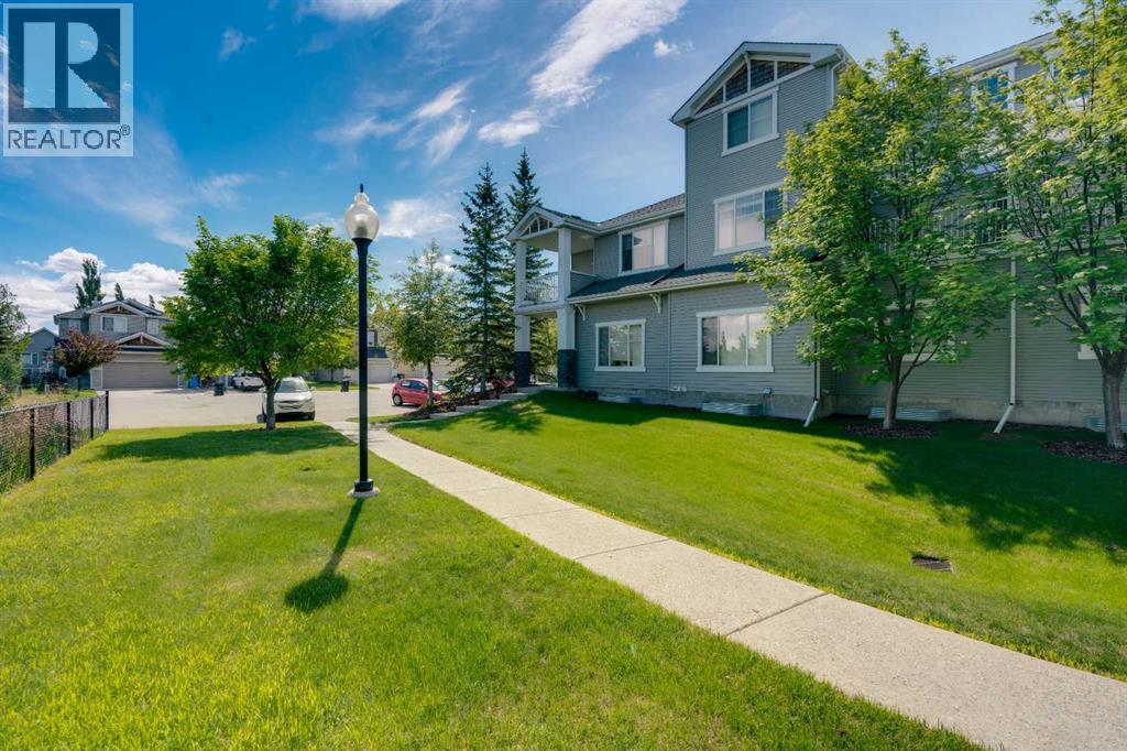 Row / Townhouse for Sale in 1306, 281 Cougar Ridge Drive SW|Calgary, Alberta T3H0J3 2