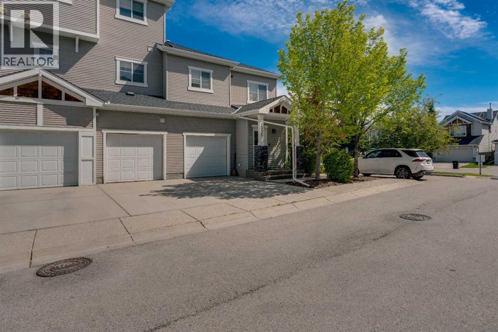 Row / Townhouse for Sale in 1306, 281 Cougar Ridge Drive SW|Calgary, Alberta T3H0J3 3
