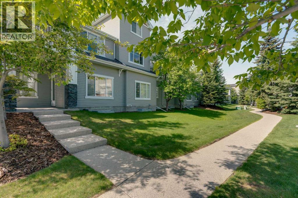Row / Townhouse for Sale in 1306, 281 Cougar Ridge Drive SW|Calgary, Alberta T3H0J3 4
