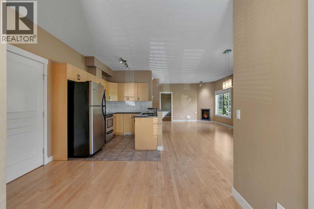 Row / Townhouse for Sale in 1306, 281 Cougar Ridge Drive SW|Calgary, Alberta T3H0J3 4