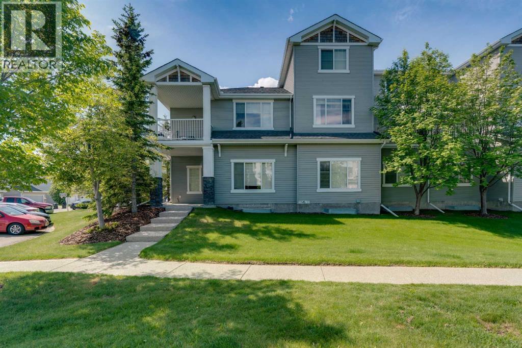 Row / Townhouse for Sale in 1306, 281 Cougar Ridge Drive SW|Calgary, Alberta T3H0J3