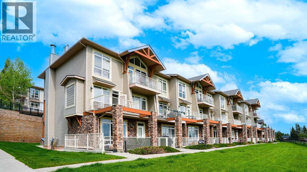 Row / Townhouse for Sale in 1, 169 Rockyledge View NW|Calgary, Alberta T3G5X1