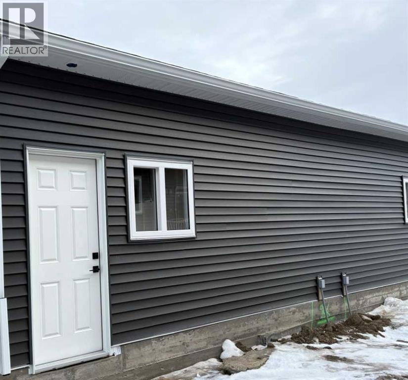 Row / Townhouse for Sale in 303 Wolf River Drive SE|Calgary, Alberta T2X6G6 4