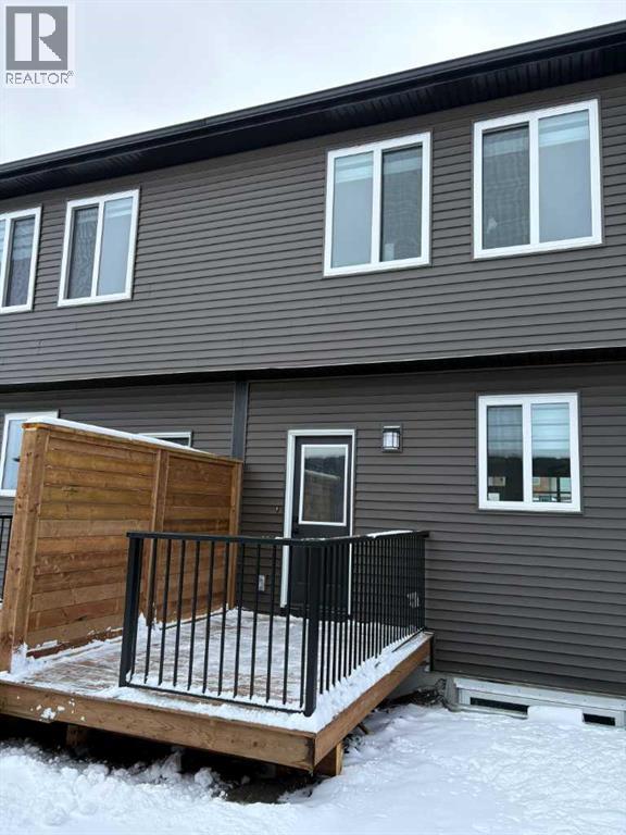Row / Townhouse for Sale in 303 Wolf River Drive SE|Calgary, Alberta T2X6G6 2