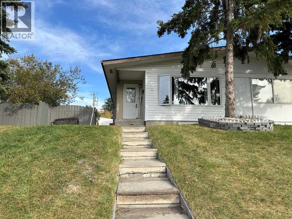 Duplex for Sale in 121 Huntford Close NE|Calgary, Alberta T2K3Y7