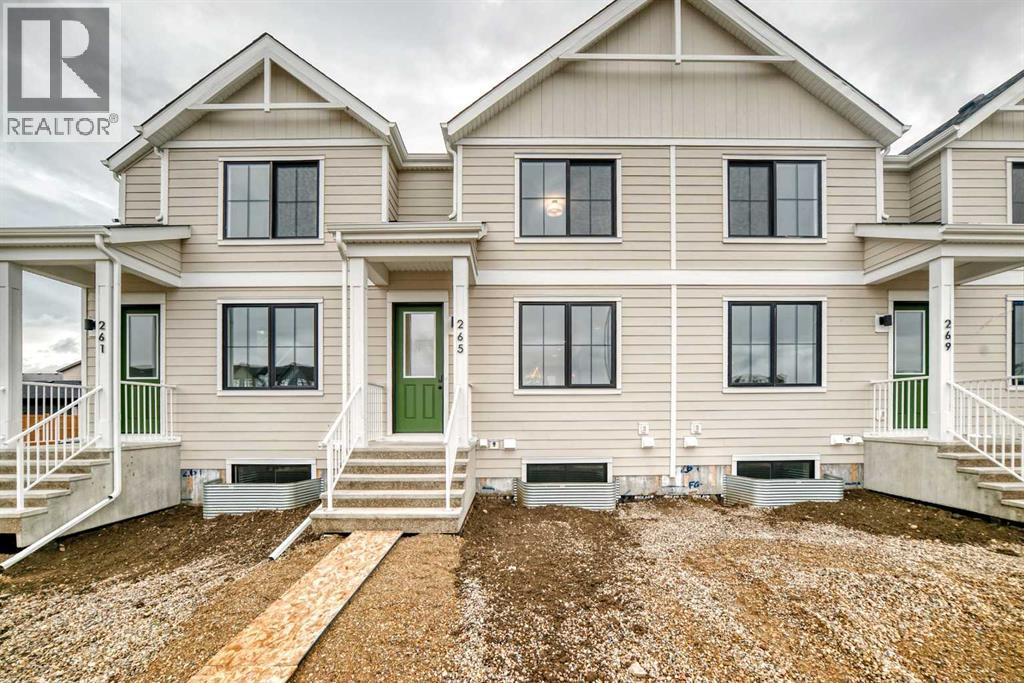 Row / Townhouse for Sale in 265 Heirloom Way SE|Calgary, Alberta T3S0P8