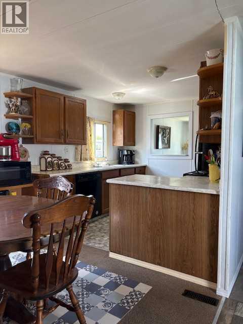Mobile Home for Sale in 302, 6220 17 Avenue|Calgary, Alberta T2A0W6 4