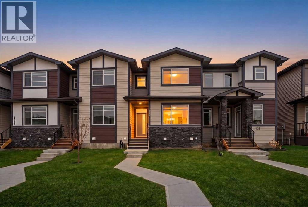 Row / Townhouse for Sale in 171 Wolf Creek Avenue SE|Calgary, Alberta T2X4V1