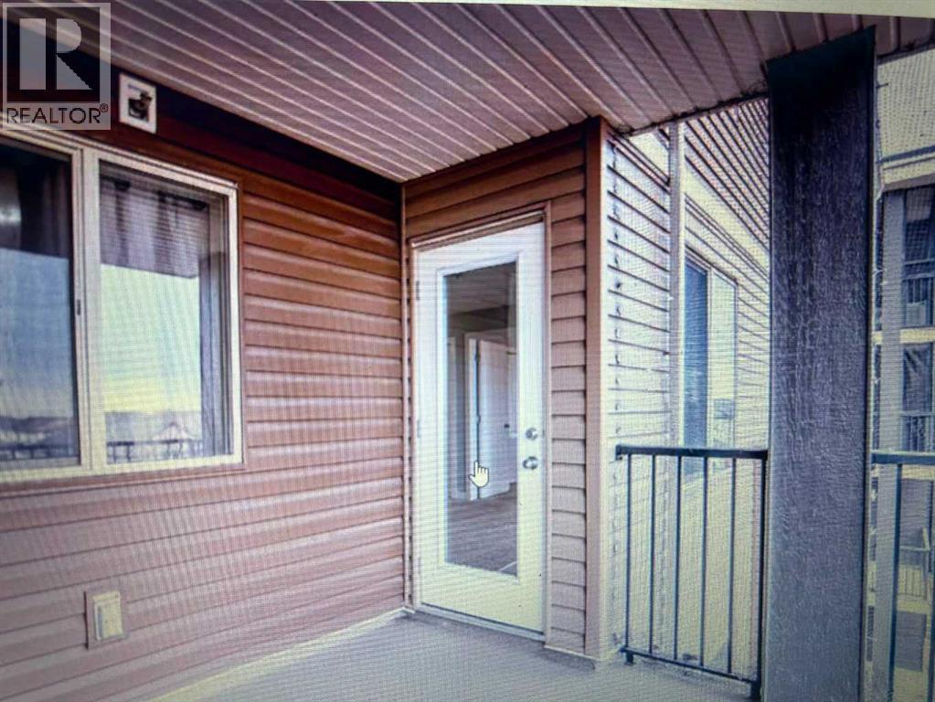 Apartment for Sale in 320, 7110 80 Avenue NE|Calgary, Alberta T3J0N4 2