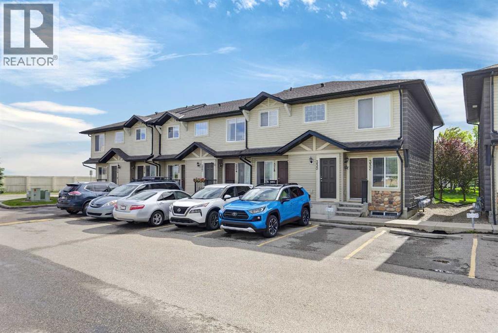Row / Townhouse for Sale in 328 Saddlebrook Point NE|Calgary, Alberta T3J0G5 2
