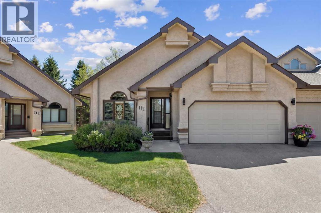 Duplex for Sale in 112 Oakbriar Close SW|Calgary, Alberta T2V5H2