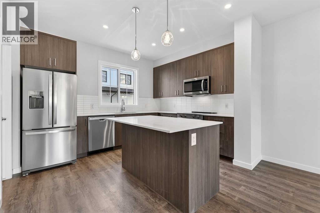 Row / Townhouse for Sale in 172 Hotchkiss Common SE|Calgary, Alberta T3S0X5 2