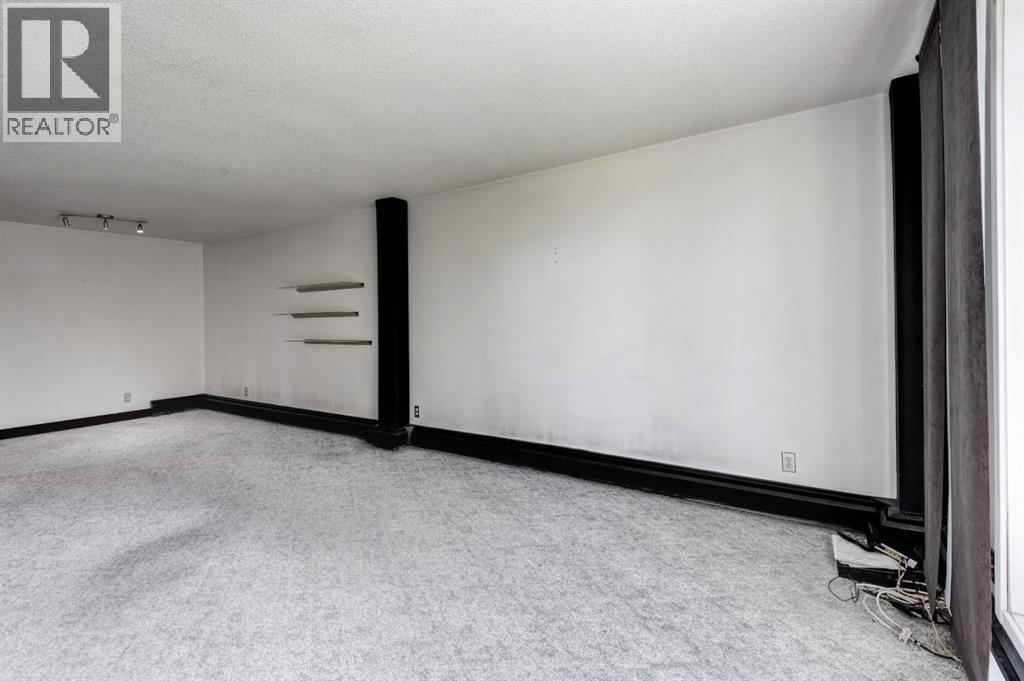Apartment for Sale in 21B, 80 Galbraith Drive SW|Calgary, Alberta T3E3H2 5