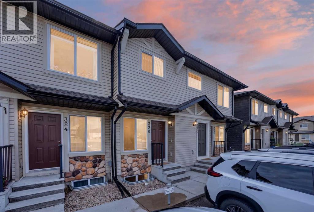 Row / Townhouse for Sale in 328 Saddlebrook Point NE|Calgary, Alberta T3J0G5