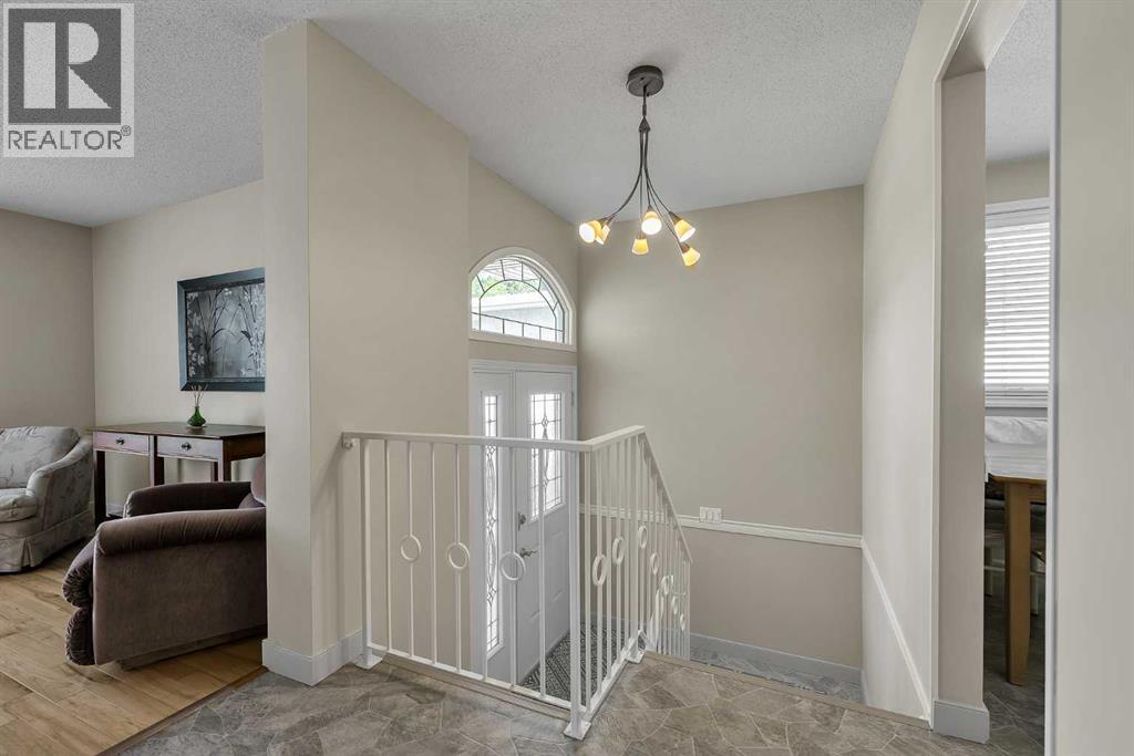 Duplex for Sale in 99 Huntford Road NE|Calgary, Alberta T2K3Z1 3