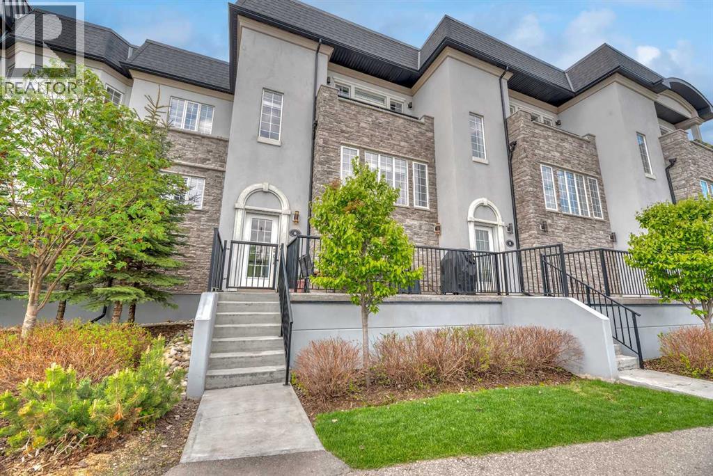 Row / Townhouse for Sale in 6 Quarry Gate SE|Calgary, Alberta T2C5M9