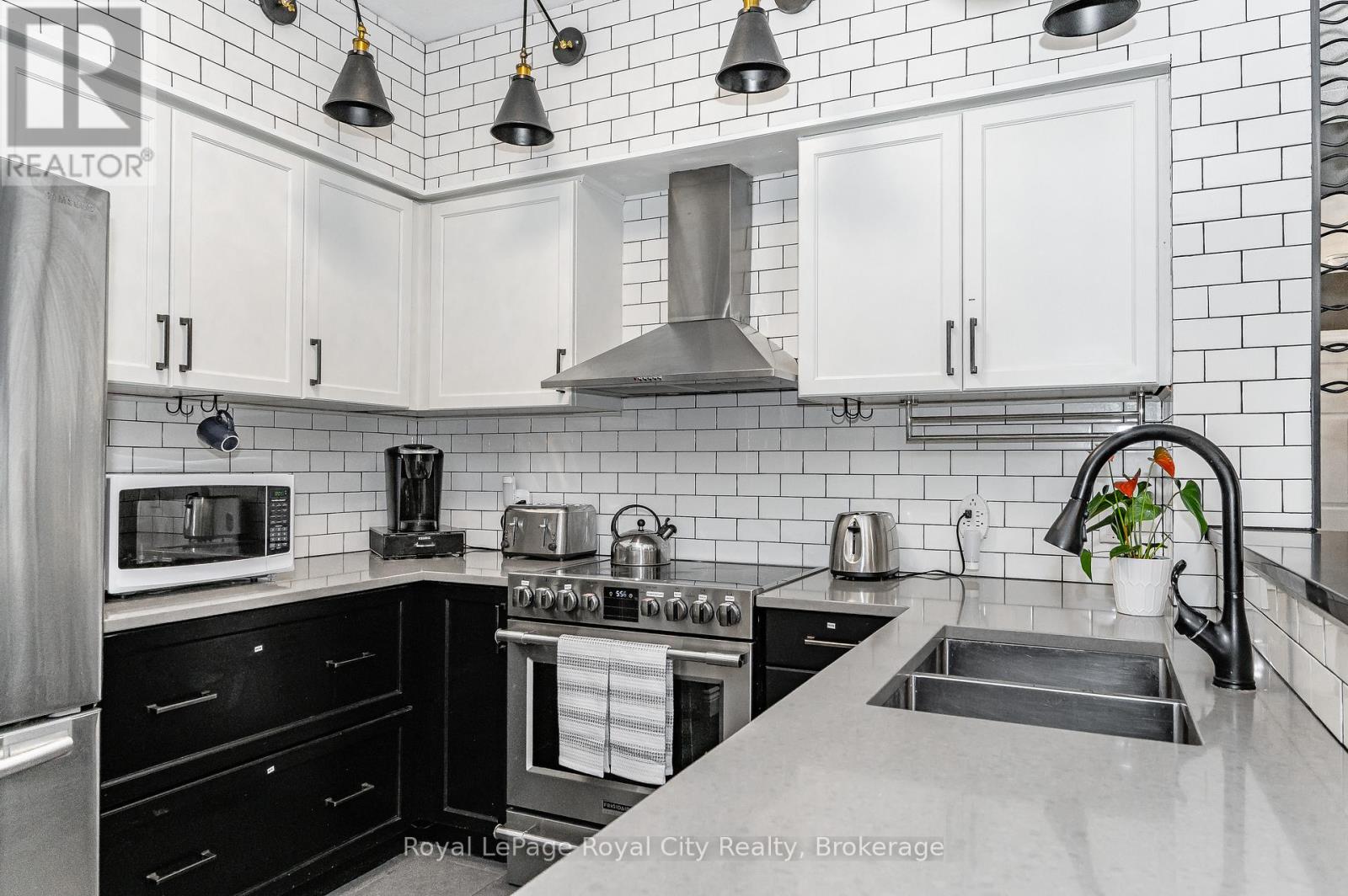 102 - 308 WATSON PARKWAY N