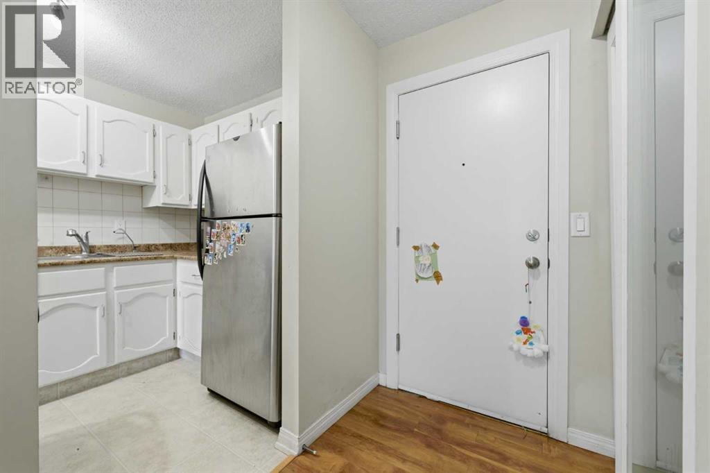 Apartment for Sale in 102, 611 67 Avenue SW|Calgary, Alberta T2V0M3 2