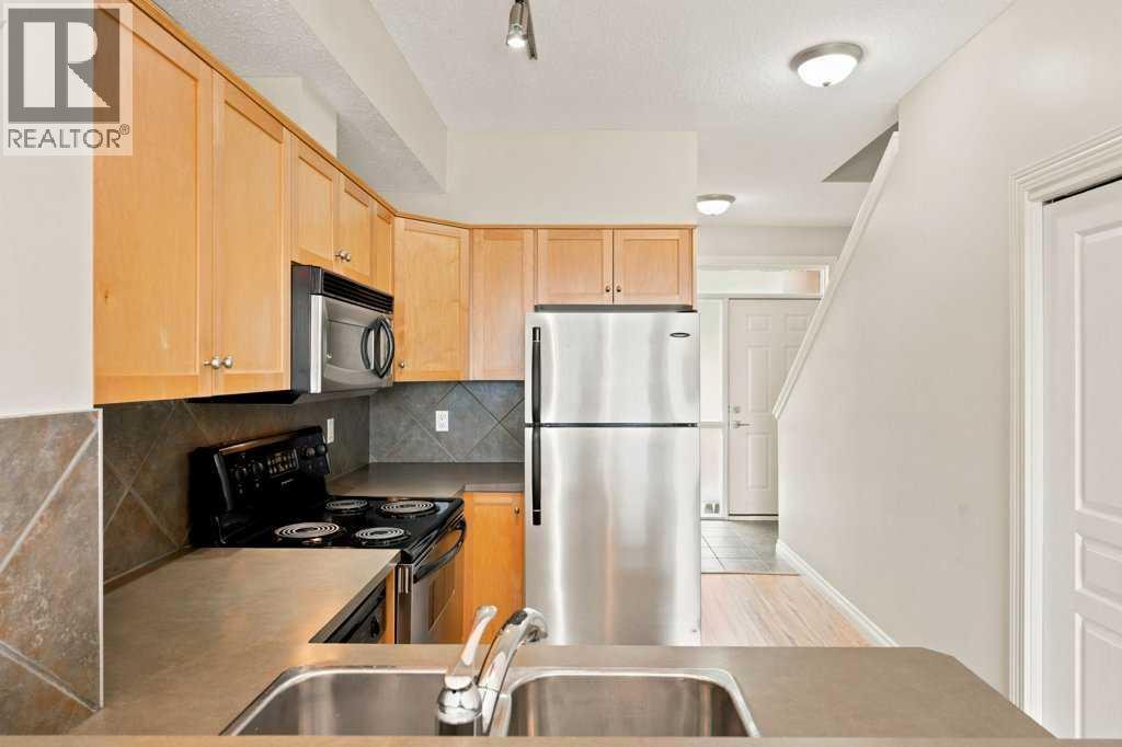 Row / Townhouse for Sale in 11, 133 Rockyledge View NW|Calgary, Alberta T3G5X2 5