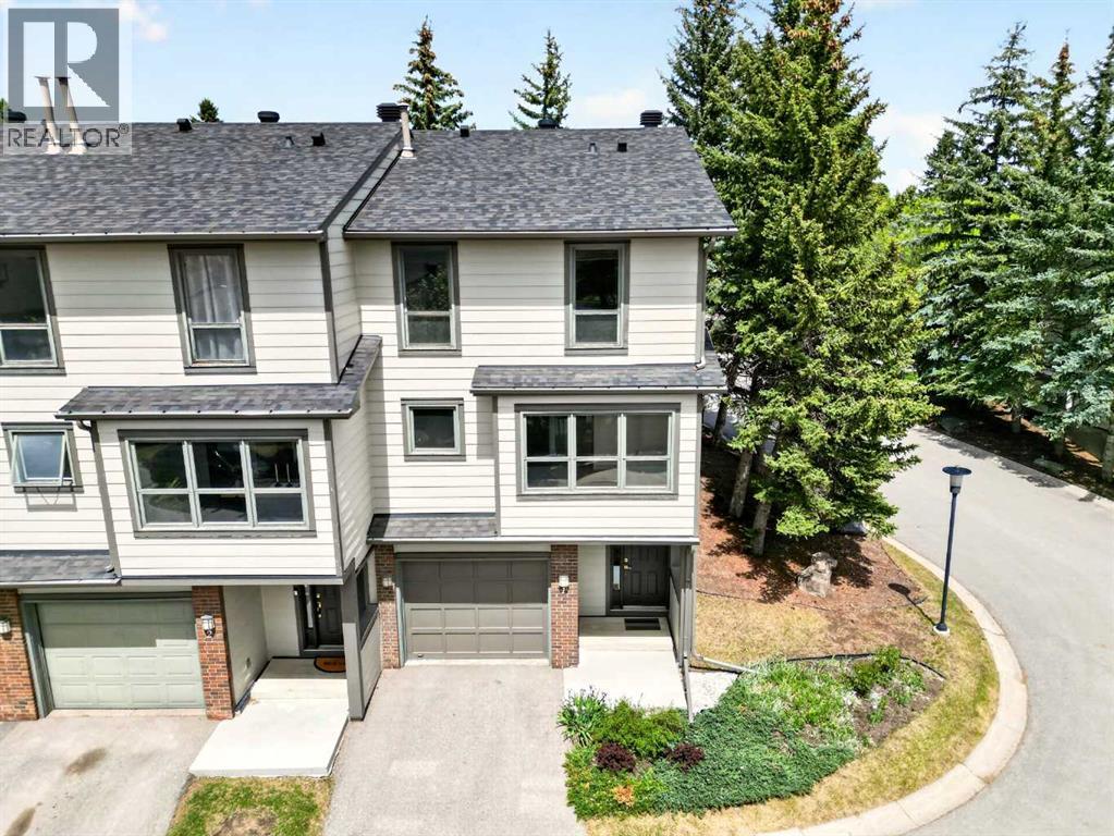 Row / Townhouse for Sale in 1, 185 Woodridge Drive SW|Calgary, Alberta T2W3X7 2