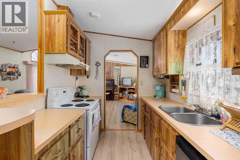 Mobile Home for Sale in 71, 99 Arbour Lake Road NW|Calgary, Alberta T3G4E4 4