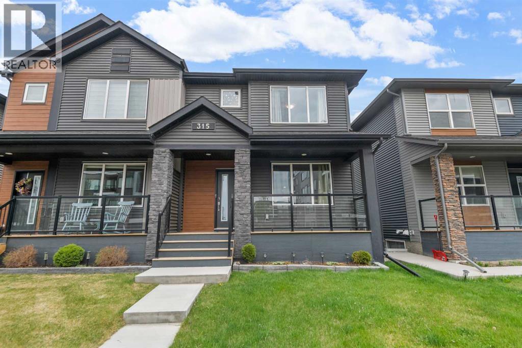 Duplex for Sale in 315 Wolf Creek Way SE|Calgary, Alberta T2X4y8
