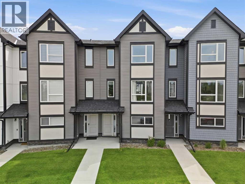 Row / Townhouse for Sale in 56 Evanscrest Manor NW|Calgary, Alberta T3P2A3